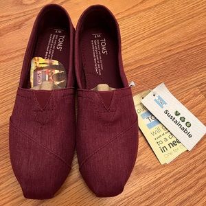TOMS Burgundy slip on shoes. NWT New with Tags